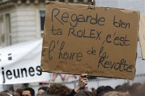 regarde ta rolex c'est l'heure de la révolte|Regarde ta ROLEX, c'est l'heure de la REVOLTE .